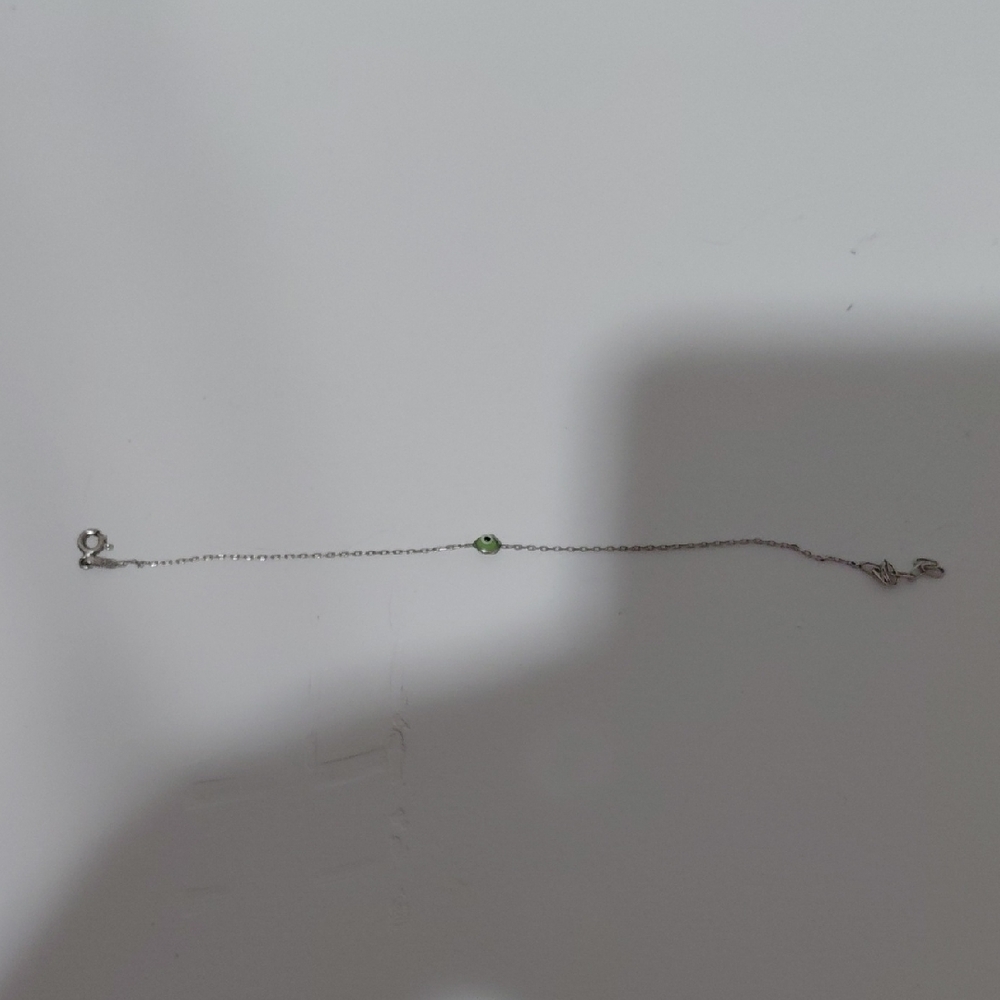 Elegant Silver Bracelet with Green Accent